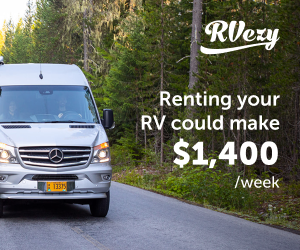 RV parked on a scenic mountain road